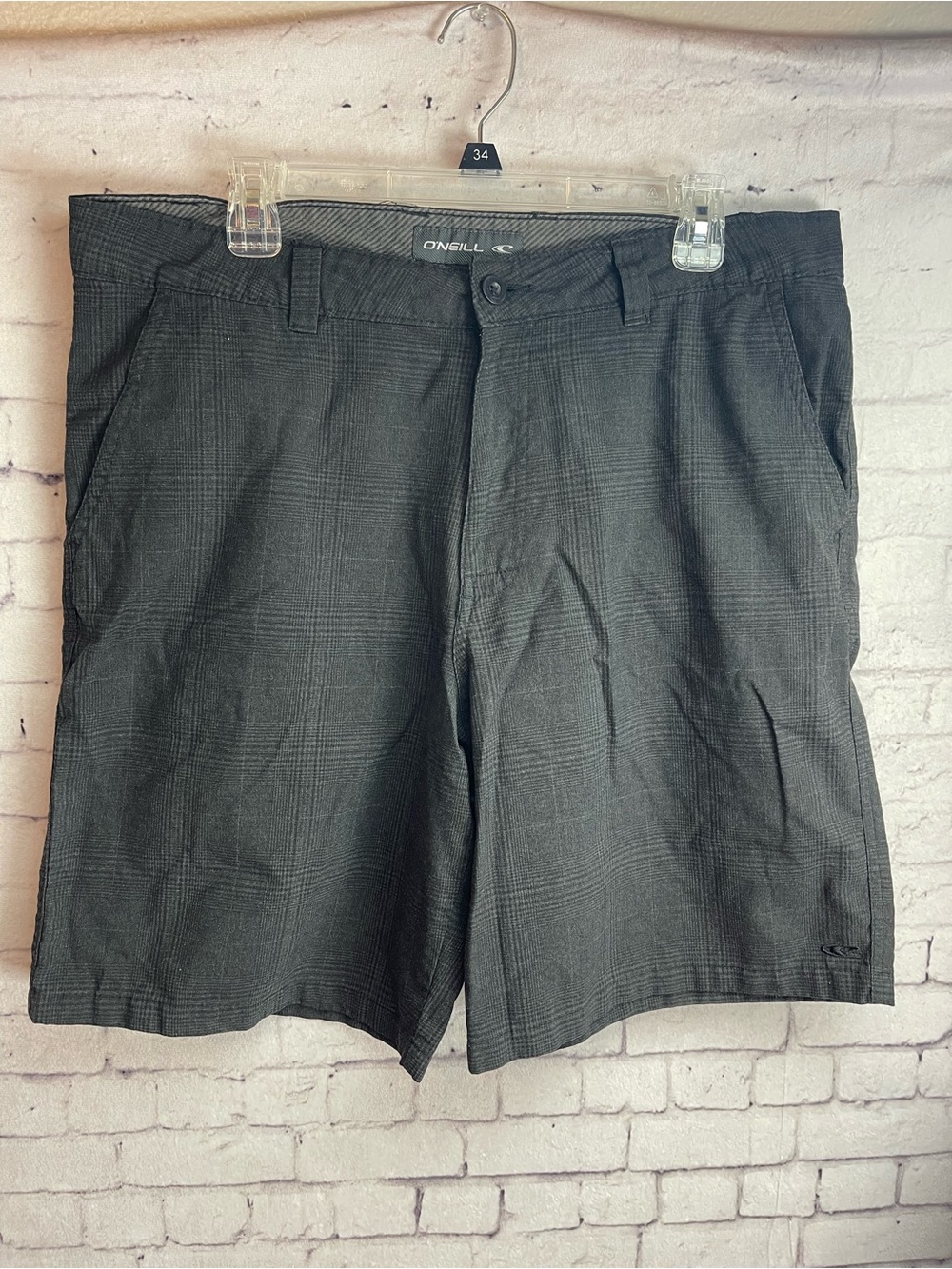 O’Neill size 26 dark gray plaid shorts